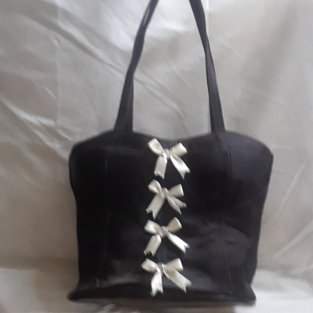 Black fabric bustier handbag w/ silver bow accents
